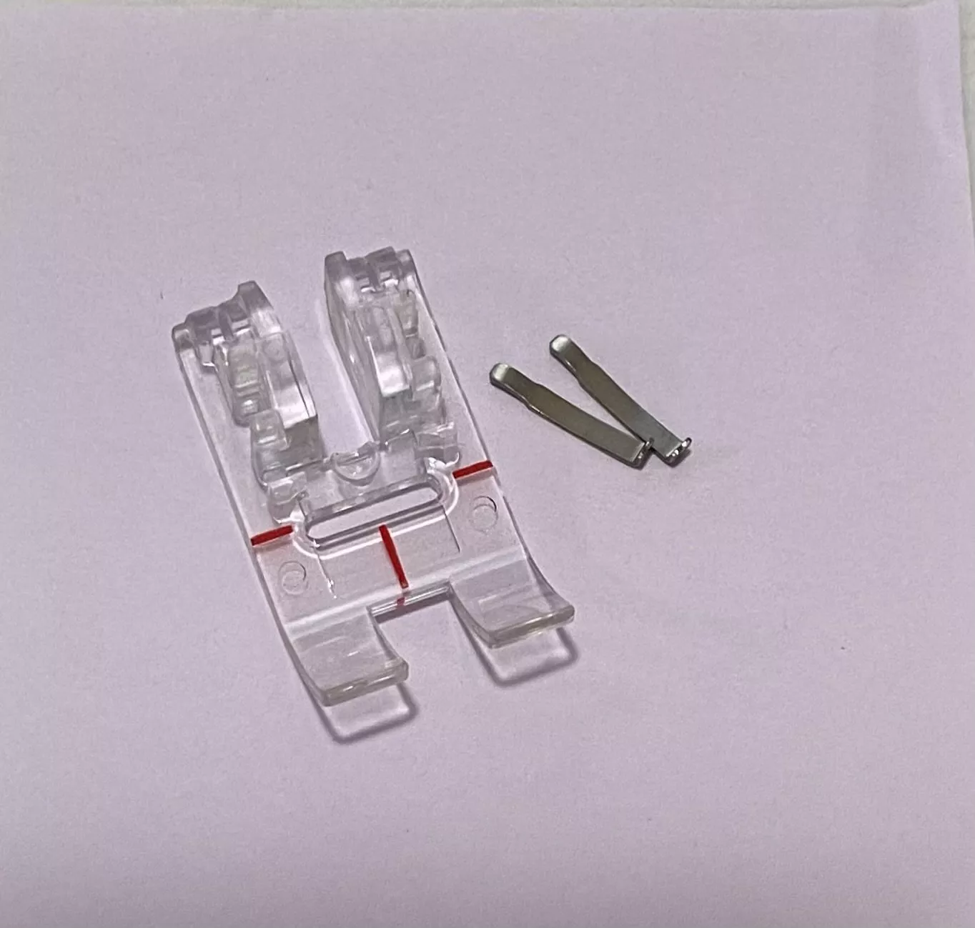 *FOOT #34D REPLACEMENT SOLE AND PINS(032435.50.00) FOR FOOT #34D//BERNINA